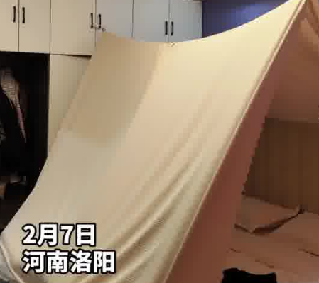 女子住酒店用一根绳子一块布防偷拍 内幕实在让人惊个呆